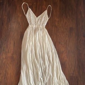Backless white spaghetti strap dress
